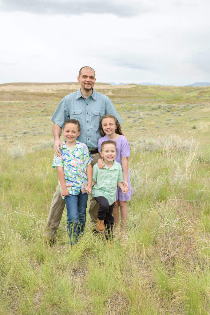 A family during a spring family photoshoot with Salt Lake Photographer Jodi Cornwall Photography.